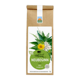 Bio Kräutertee Neubeginn in brauner Papiertüte mit weißem Etikett, grünem Rundlabel und Kräutermotiv aus gelben, weißen und grünen Pflanzen; Aufdruck ‚klärt & inspiriert‘ und Hinweis ‚enthält Coffein