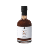 Freigestellte Feigen-Balsamico Flasche