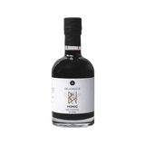 Freigestellte Honig-Balsamico Flasche