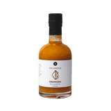 Freigestellte Orangen-Balsamico Flasche