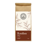 Rooibos Pur Tee der Mühle Ahrenshoop – Rooibostee in brauner Papierverpackung mit braunem Etikett.