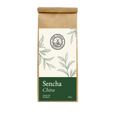 Sencha China – Grüner Tee der Mühle Ahrenshoop in brauner Papierverpackung mit grünem Etikett.