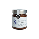 DELIGREECE Dunkle Feigen Chutney im Glas – 80 % frische Früchte, goldener Deckel, weißes Etikett mit Feigen-Illustration.